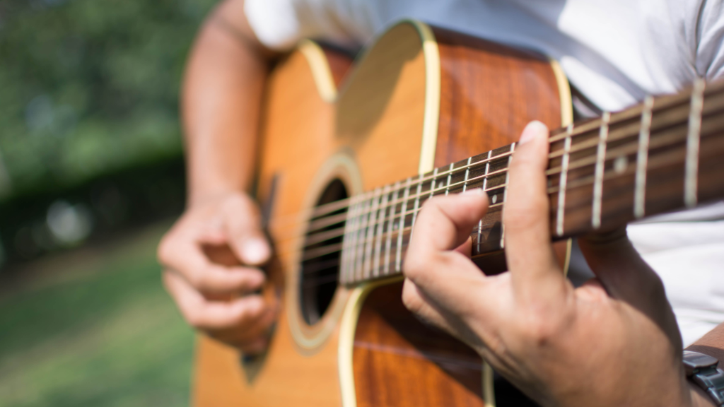 Man playing acoustic guitar